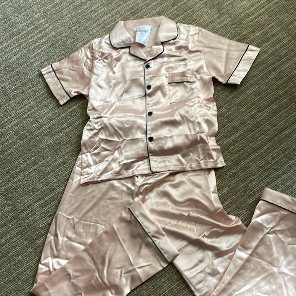 NWT Girls Satin Pajama set in size 8. Super cute! It was just too small for us